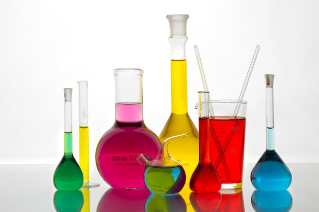 Laboratory glassware containing colorful substance