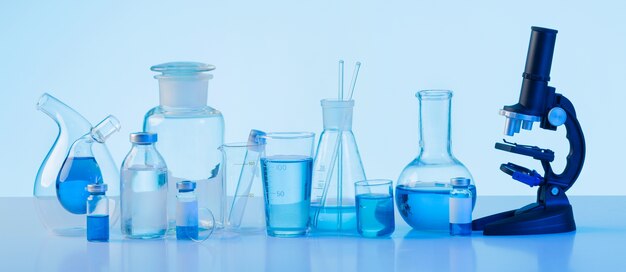 Laboratory glassware and microscope