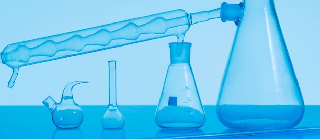 Laboratory glassware with blue background