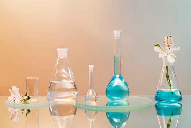 Free photo laboratory glassware with blue liquid assortment