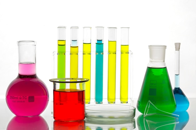 Free photo laboratory glassware with colorful liquid