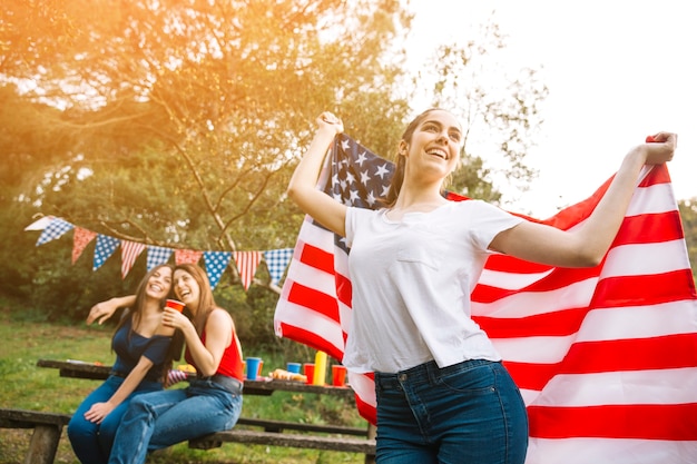 Free photo lady dancing with flag