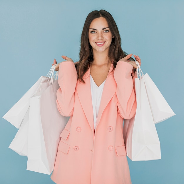 Lady in pink suit looking at camera