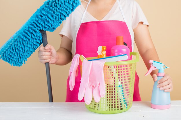 Lady with cleaning products