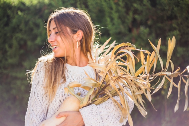 Free photo lady with dry herbs and marrow