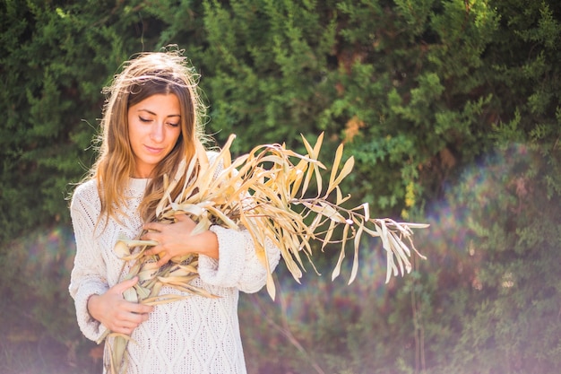 Lady with dry herbs