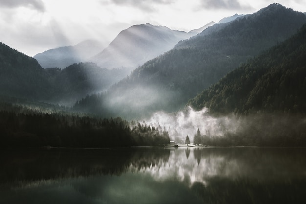 Free Photo lake surrounded with mountain