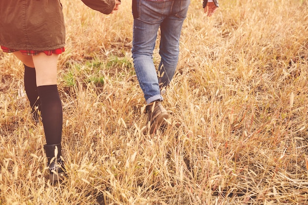 Landscape portrait of young beautiful stylish couple sensual and having fun outdoor