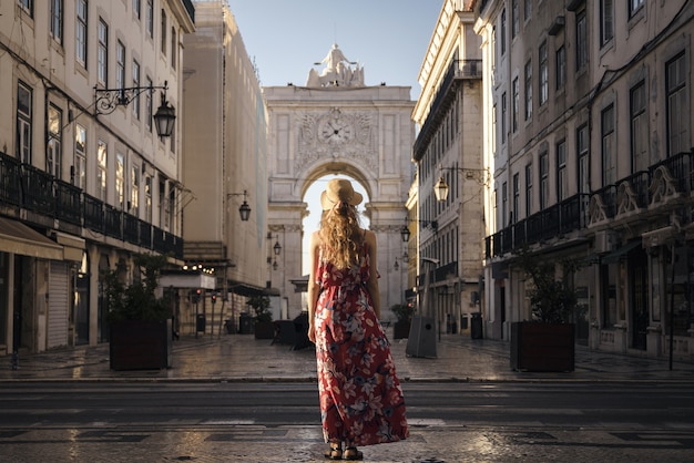 A landscape shot of a young female traveler