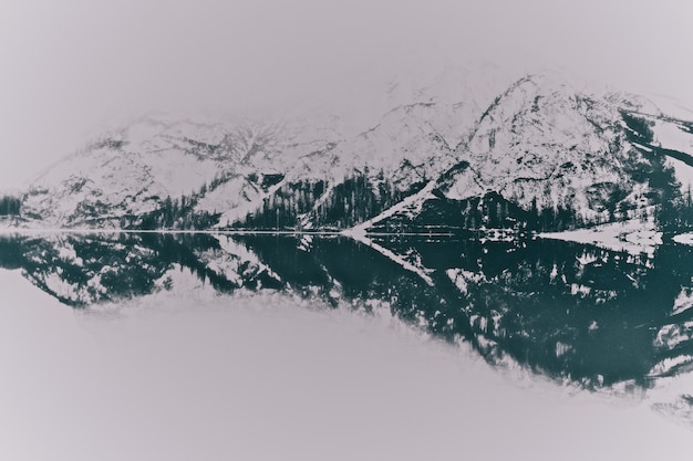 Free Photo landscape of snowy mountains near lake