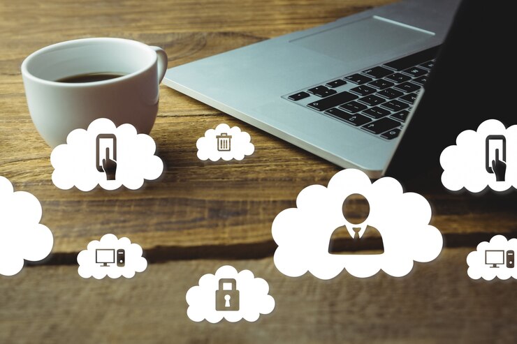 Free Photo laptop and coffee cup 