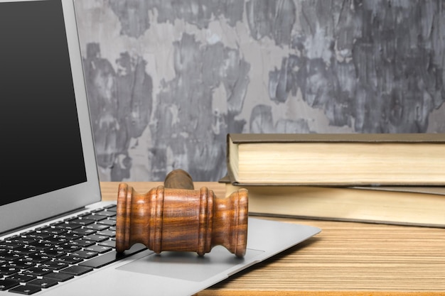 Laptop And Mallet On Table