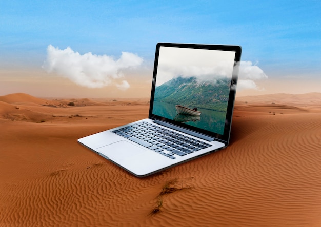 Free photo laptop in nature concept