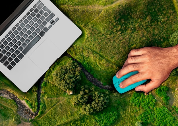 Free photo laptop in nature concept