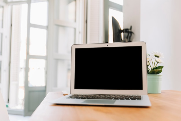 Laptop in stylish room