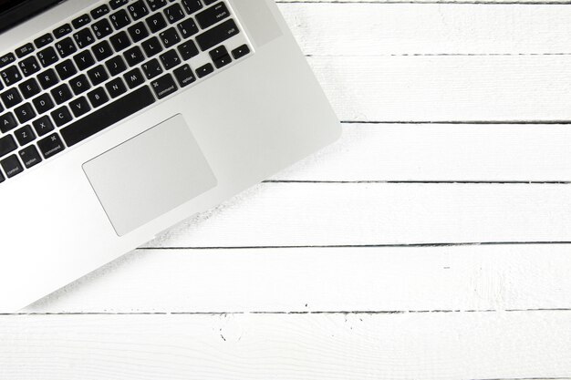 Laptop on white table