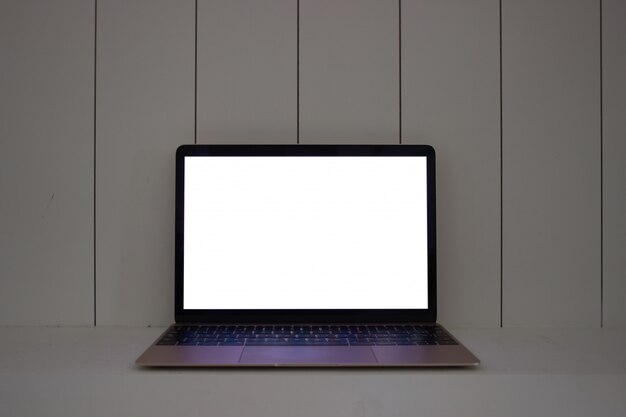  Laptop with blank screen on wood