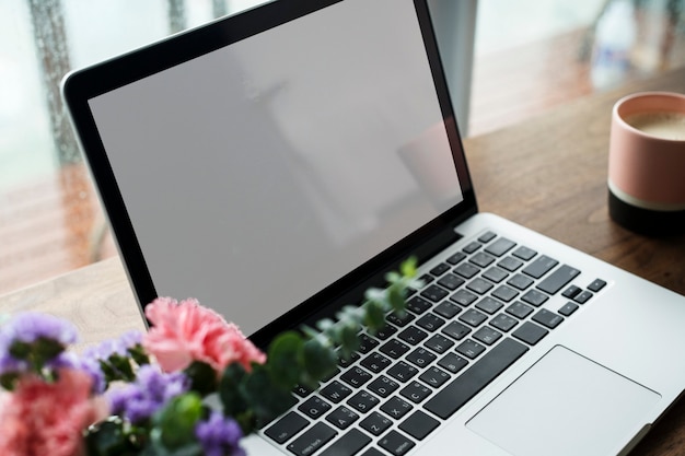 Laptop on a wooden table