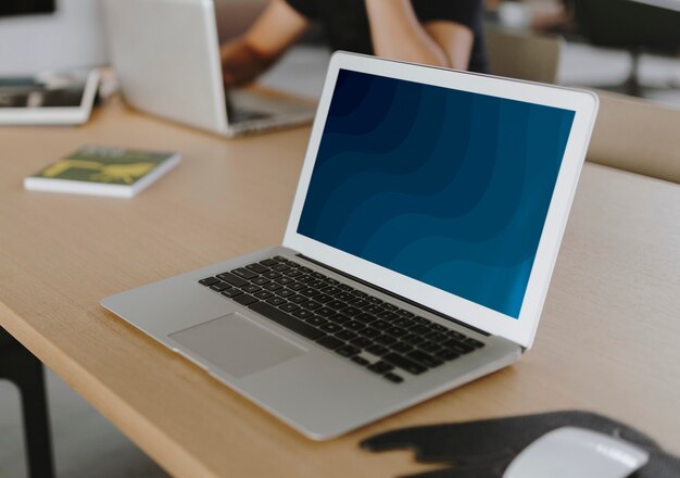 Laptop on a wooden table