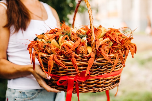 Free photo large basket with cooked red large crayfish