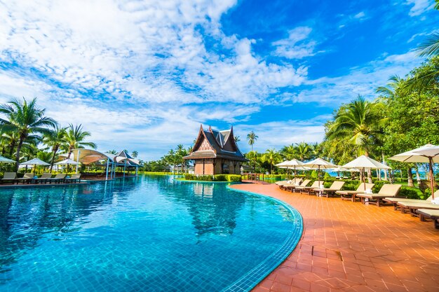 Large pool with umbrellas and hammocks