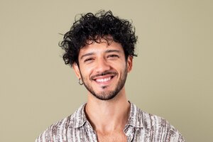 Free photo latin man smiling cheerful expression closeup portrait