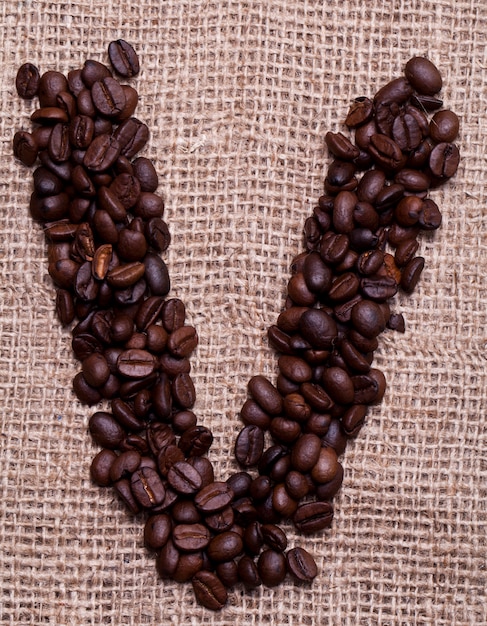 Free photo latter from coffee beans