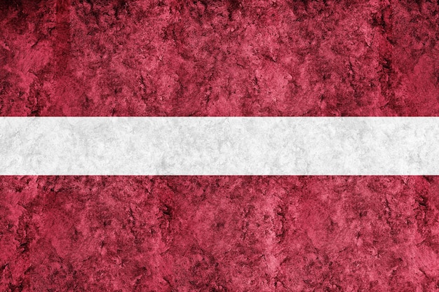 Free photo latvia metallic flag, textured flag, grunge flag