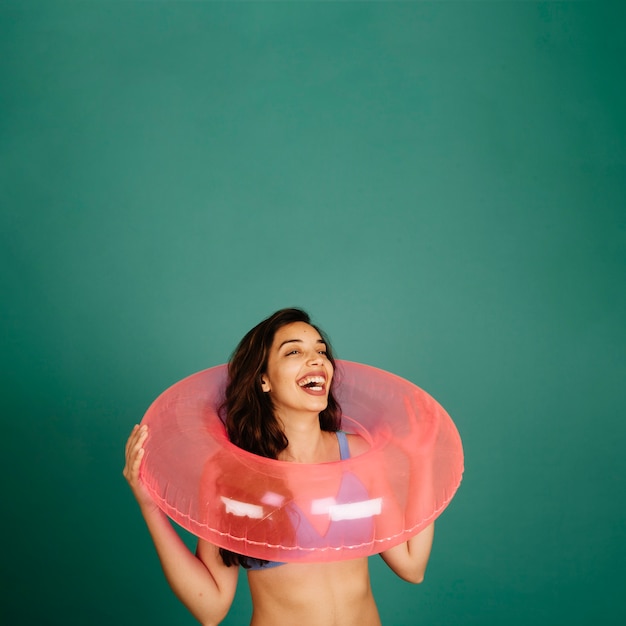 Laughing girl with inflatable ring