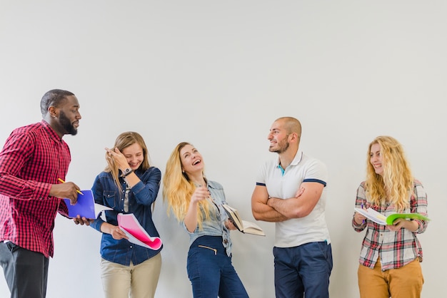 Laughing people collaborating and studying