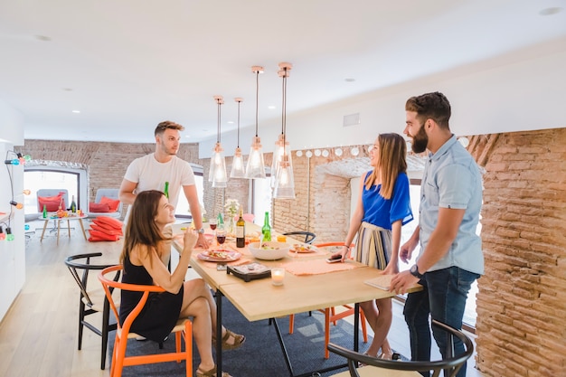 Laughing people at table 