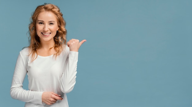 Laughing woman pointing