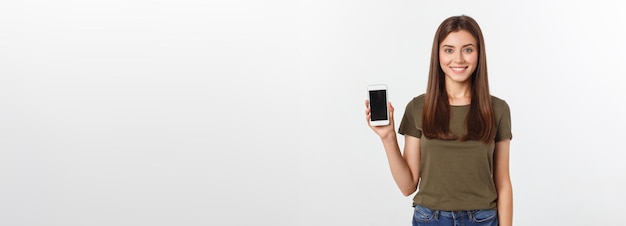 Free photo laughing woman talking and texting on the phone isolated on a white background