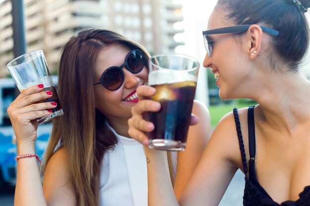 "Laughing woman with coke"