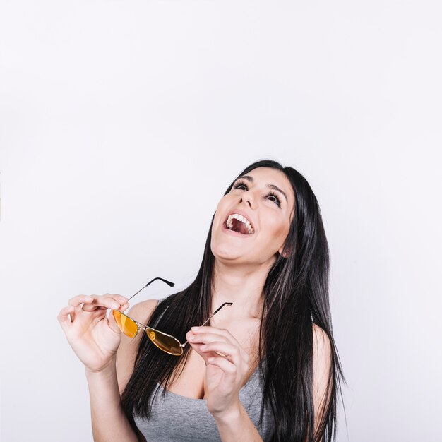 Laughing woman with sunglasses