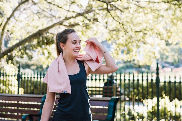 Laughing woman with towel