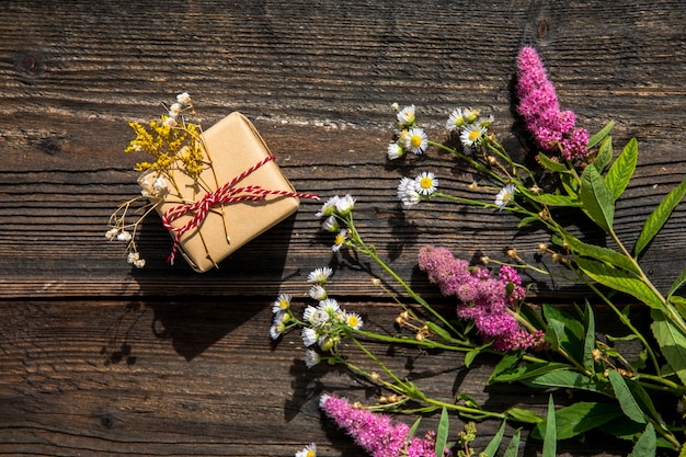 Free photo lavander bouquet and small gift