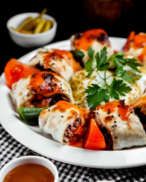 Lavash rolls with meat on the table