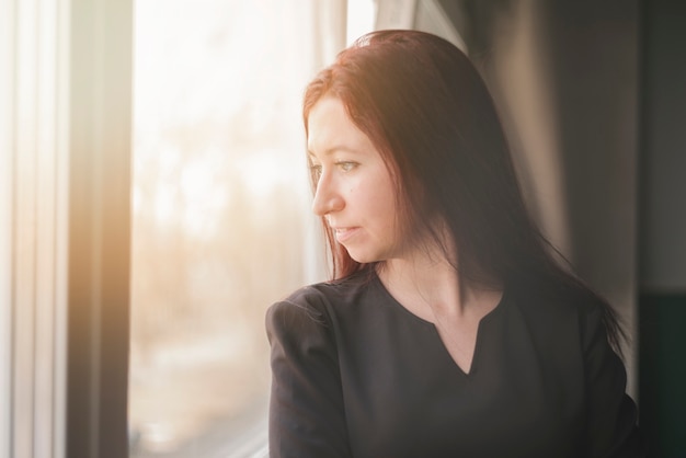 Lawyer looking through the window