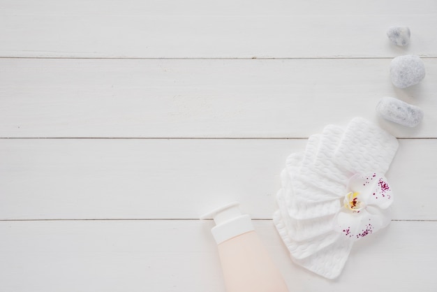 Free photo lay out of body care items on white table