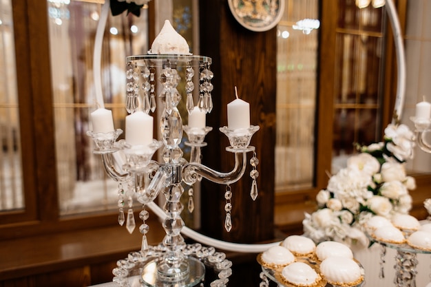 Layered candlestick stand on a holiday table