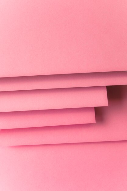 Layered of pink colored card paper backdrop