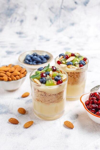 Layered trifle dessert in serving glasses.