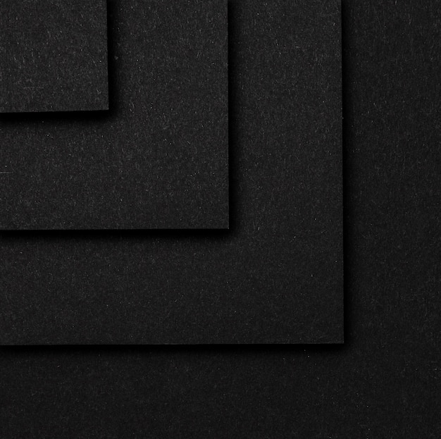 Layers of black squares background top view