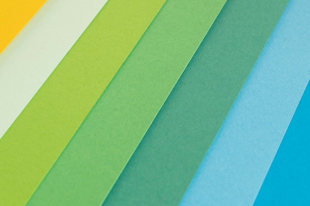 Layers of gradient green colored papers