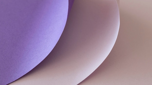 Layers of gradient violet colored papers