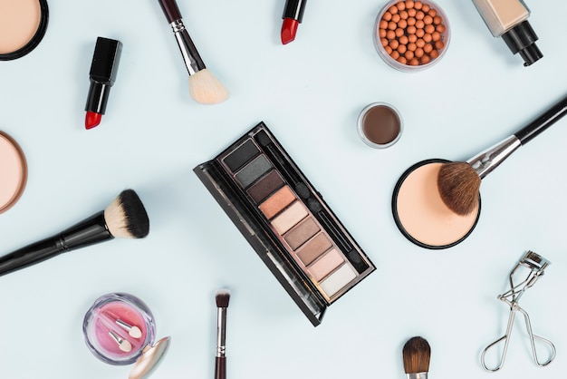 Layout of makeup product on light background