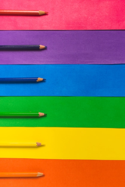 Layout of pencils and bright LGBT flag