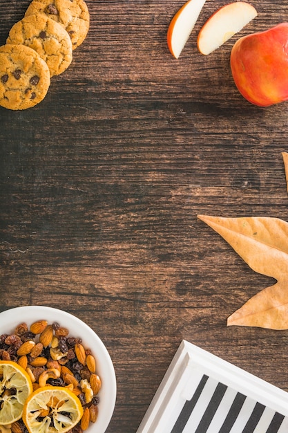 Leaf and frame near snacks