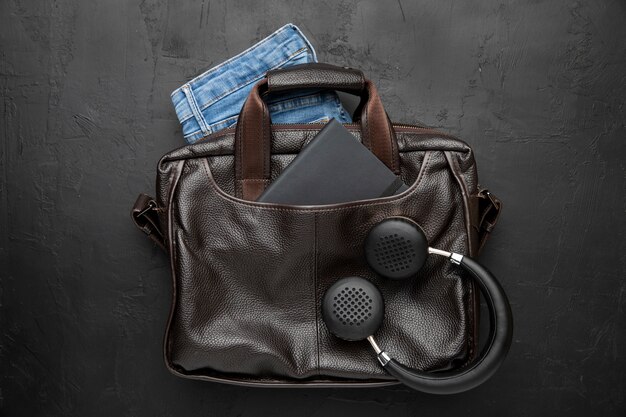 Leather bag for travel with headphones